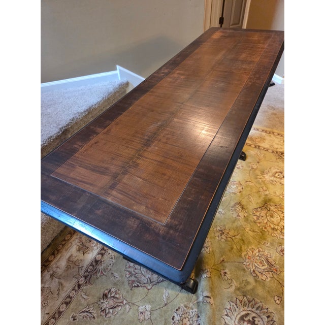 Beautiful bench-made solid wood Spanish Baroque style library table. The warm distressed finish trestle style table...