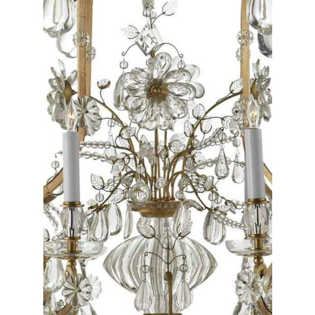 Urn and floral motif. Beautifully detailed with a center urn, crystal flower embellishments. beads, and etched leaf...