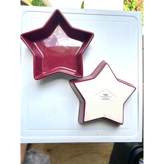 Great item to use at a BBQ or Patriotic themed event. Chantal ceramic star-shaped dishes in a maroon or paprika red...