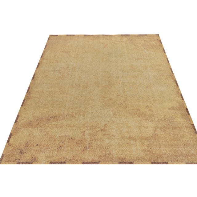 From Rug & Kilim’s Homage collection, a 9x12 distressed style abstract rug relishing a positive-negative play of luscious...