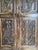 Bring timeless character to your home with this vintage floral carved barn door, handcrafted from reclaimed wood and rich...