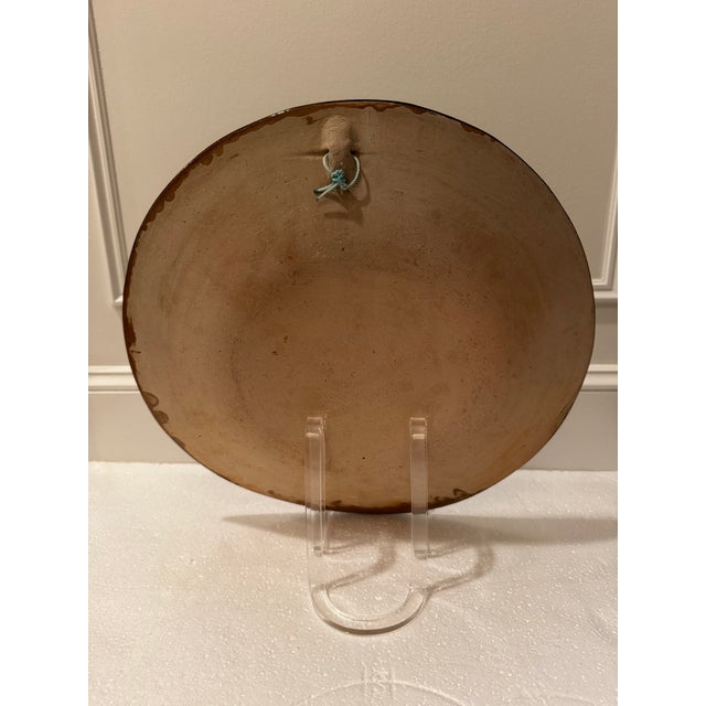 Vibrant Mexican decorative 16” plate features hand painted grape harvest design on black background. From the Guerrero...