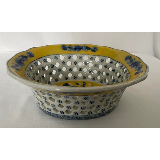 Beautiful Blue and Yellow Canton China Reticulated Basket Bowl with floral motif. Classic in style and heavy in weight, it...