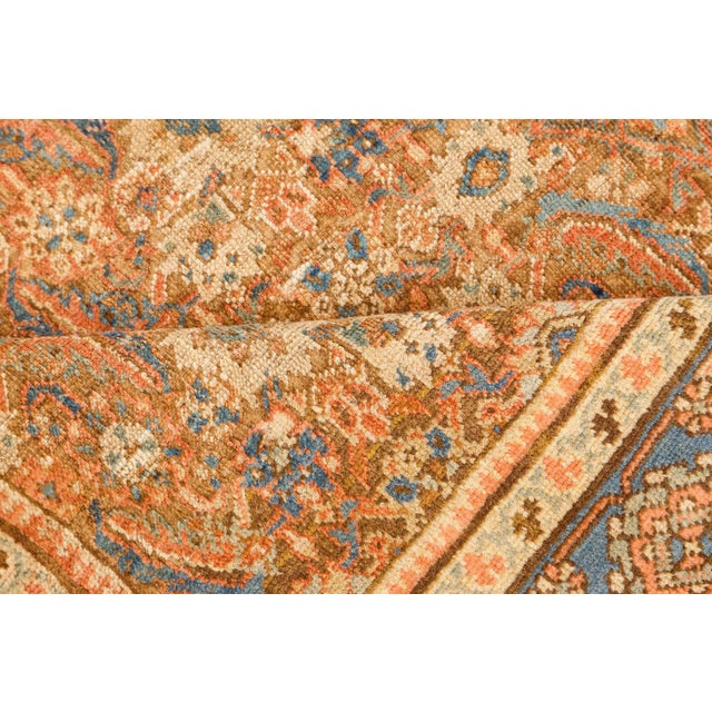 The antique Feraghan rug before your eyes is an exceptionally beautiful example of Persian craft. Its captivating light...