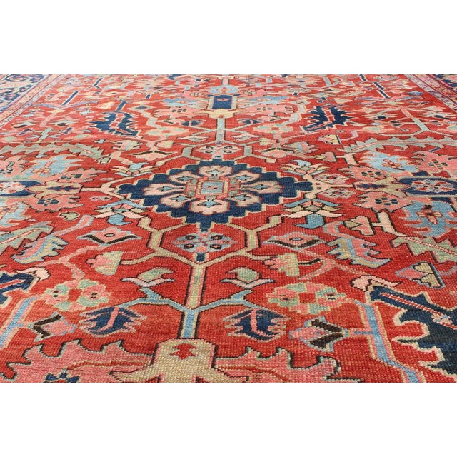 Textile Early 20th Century Antique Persian Medallion Serapi Rug With Red Background and Blue Border For Sale - Image 7 of 9