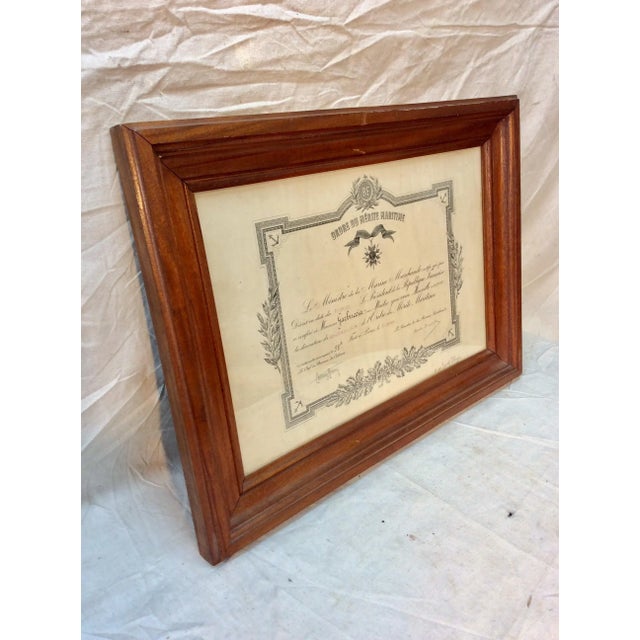 Found in the South of France, this Early 20th Century Order of Maritime Merit Certificate is framed in wood and dates to...