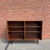 A beautifully grained Danish Modern rosewood bookcase dating to the 1960s. The dramatic rosewood veneer showcases striking...