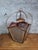 A sumptuous hanging lantern in the classical baroque style, likely of italian or mediterranean origin, dating from the...