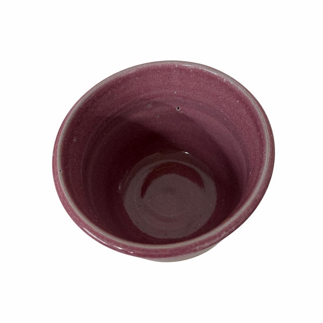 Vintage art pottery planter in dark pink and ombré mocha brown. Signed by artist. Measures 5.75” diameter x 4” h.