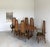 Unusually proportioned rattan and hand-caned dining chairs in an extra large, full set of eight. The set consists of six...