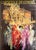 Color poster reproducing a painting by Italian artist Mario Gianello (b. 1935), depicting the Carnival of Venice. The...