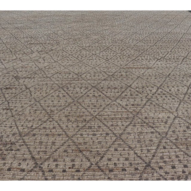 Modern Moroccan Rug in Wool by Keivan Woven Arts 10'5 x 13'10 Measures: 10'5 x 13'10. This modern casual tribal rug has...