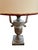 This pair of urn lamps has a base of wood, painted silver. The shade have gold cord and red borders. These matching lamps...