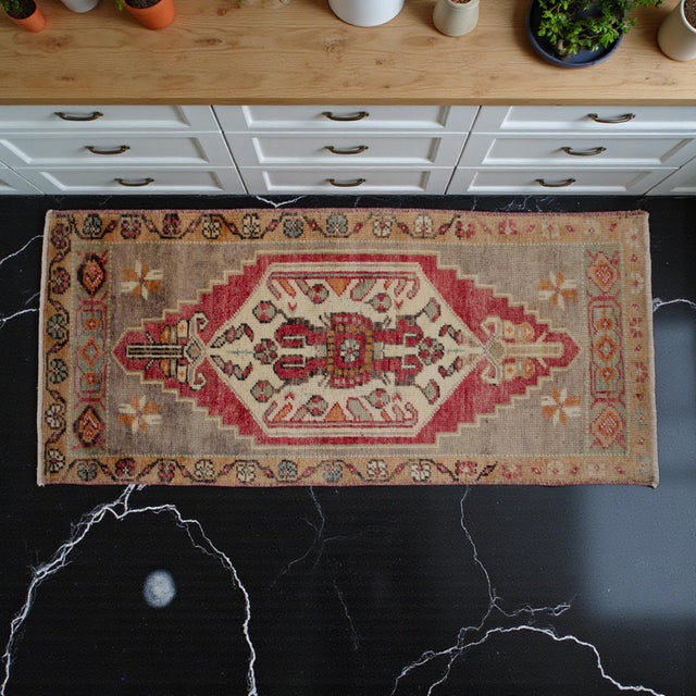 Vintage Turkish hand-knotted small rug from Oushak, 1970, featuring warm greige tones and authentic village craftsmanship...