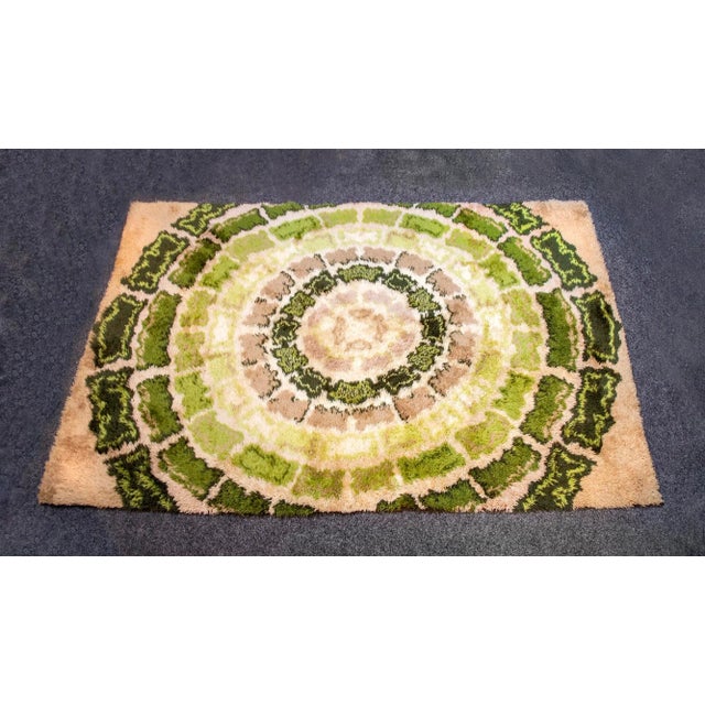 Rug with psychedelic designs in pure wool. Italian production 70's