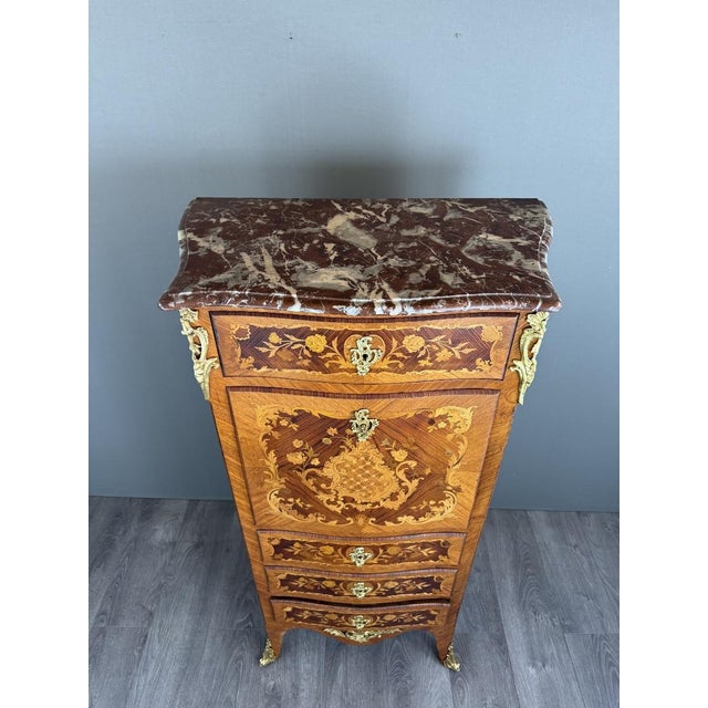 An elegant Louis XV style secretary desk, dating from the second half of the 19th century, the Napoleon III period. This...