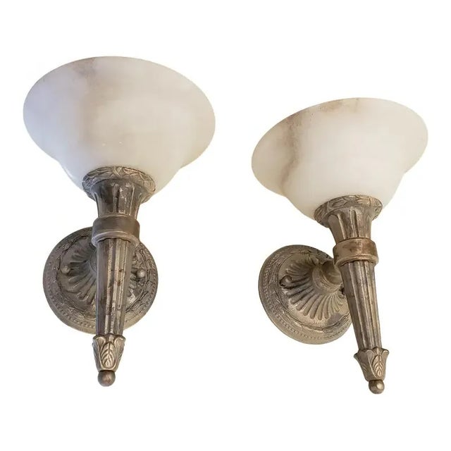 The design of the Cristal Aslan Wall Sconce is based on Early 19th Century Regency Balloon and Empire Basket oil-burning...