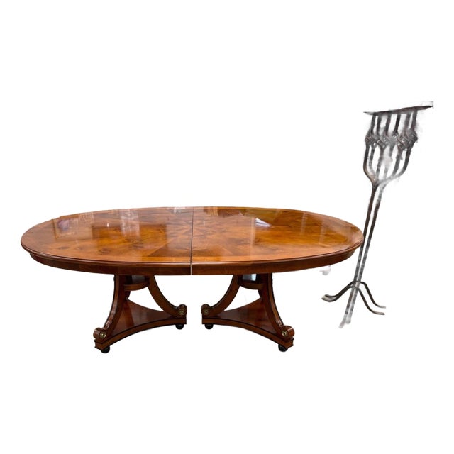 Vintage Neoclassical Regency Style Cherry and Burl Wood Pedestal Oval Dining Table With 2 Leaves For Sale
