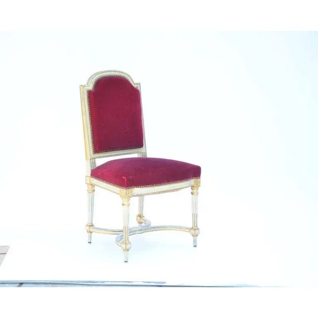 Set of 5 red chic crimson velvet chairs in the style of Maison Jansen. Very sturdy and comfortable. Original upholstery is...