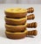 Wonderful set of 4 vintage French ceramic quail's egg or escargot holders. The yellow and brown-colored four-piece set is...