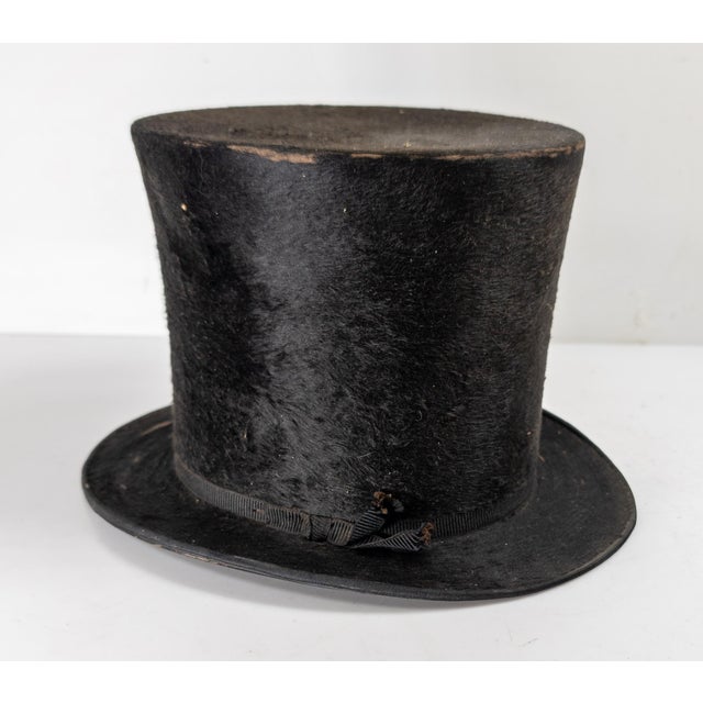 We are selling this 19th Century American top hat with beaver skin. This top hat has traditional form and is signed on the...