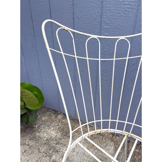 Classic pair of mid-century outdoor patio chairs attributed to Homecrest (they are unmarked). These appear to be the...