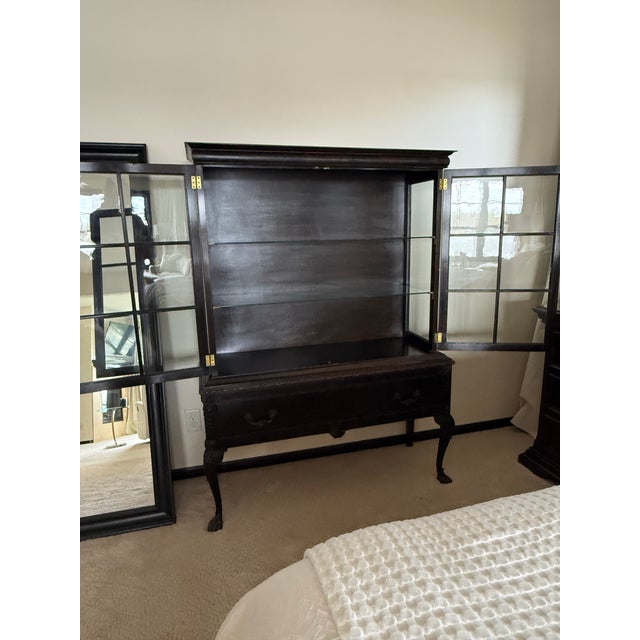 Solid Mahogany ball and claw foot glass front and glass sides cabinet with two glass shelves and one drawer.
