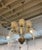 Stunning and elegant Italian Mid-Century Modern chandelier by Barovier e Toso. Having six Murano glass shades with six...