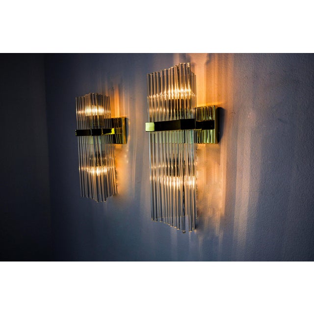 Very beautiful and rare pair of wall lights from the house of sciolari for lightolier dating from 1970. Made up of crystal...