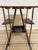 This table is an early 1900s Primitive English Burnt Bamboo multi tier side table. Its crafted from rustic scorched bamboo...