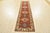 This traditional tribal geometric Caucasian Kazak runner is hand-knotted with an all-wool pile on a cotton foundation....