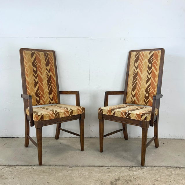 Transform your dining experience with this stunning set of six vintage modern highback dining chairs. These chairs are the...