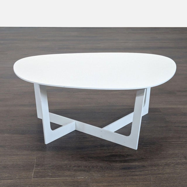 This Insula Coffee table was designed by the Danish duo, Ernst & Jensen. This table was produced by Erik Jorgensen in...