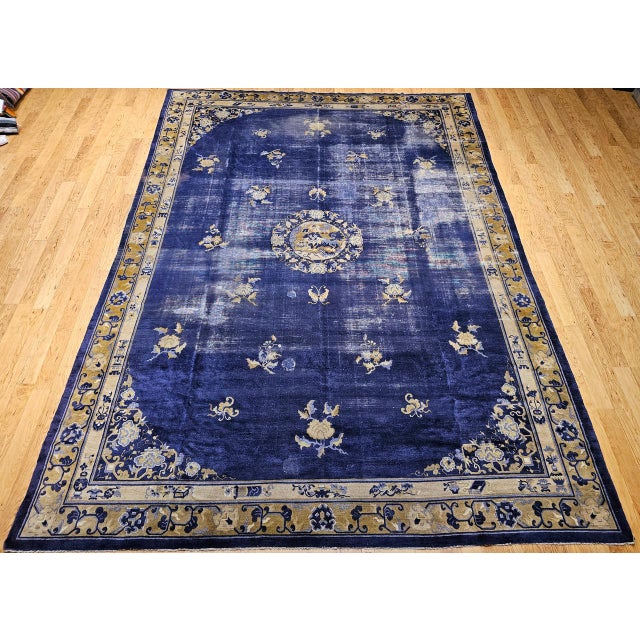 Imbued with history and cultural meaning, this 19th century Chinese Peking rug is a masterful expression of traditional...