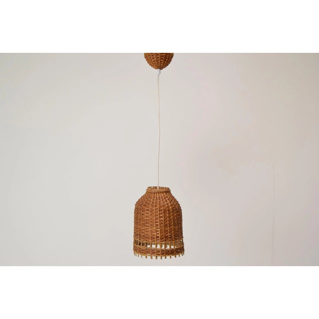 Made in czechoslovakia. Made of wicker and wood. New cabling. 1xe27 or e26 bulb. Original condition us wiring compatible....