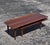 The timeless design of a mid century surfboard coffee table never goes out of style. This Bassett Artisan switchblade is a...