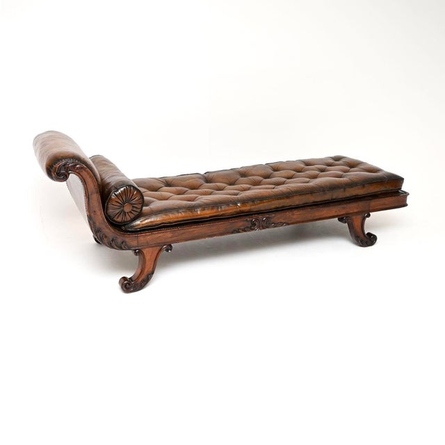 A stunning antique Regency period leather chaise longue. This was made in England, it dates from around the 1810-1820...