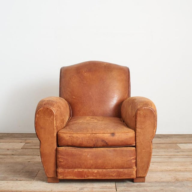 Antique French Leather Club Chair Early twentieth century French leather club chair with a classic moustache arched...