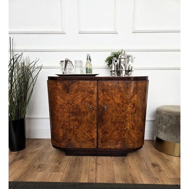 Very elegant Italian Mid-Century Art Deco bar cabinet credenza in burl veneer wood with great details such as the handes...