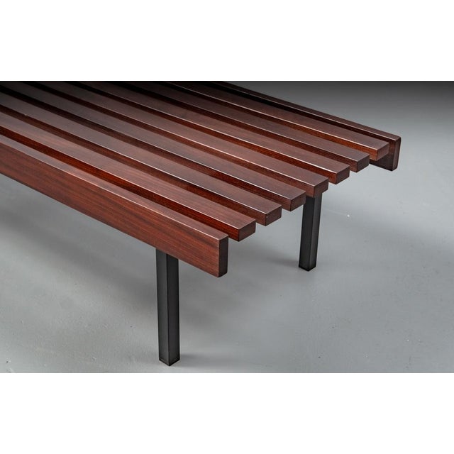 Large Wiener Werkstätten mahogany bench from the 1960s. Rare Wiener Werkstätten Typ sapeli mahogany bench with 9 ribs and...