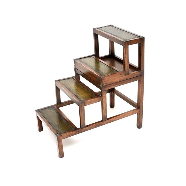 A charming and beautifully designed antique metamorphic coffee table / library steps. This was made in England, it dates...