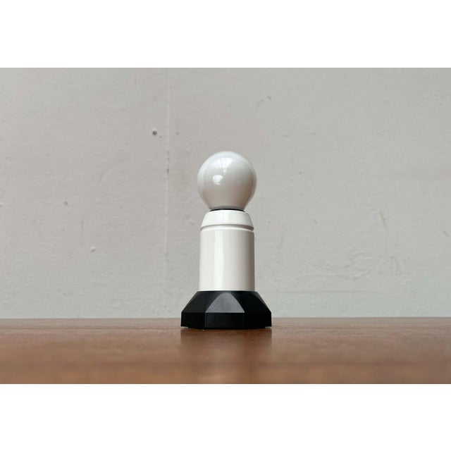 Italian wall and ceiling lights by Arteluce, designed by Paolo Piva in the 1980s. A postmodern design. The Le Stelle...