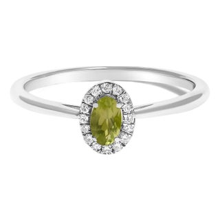10K White Gold 5X3MM Oval Green Peridot and Diamond Accent Halo Ring (I-J Color, I1-I2 Clarity) - Ring Size 7.5 For Sale
