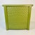 A Mid-Century staple in homes across America. This plastic hamper is from the 1960s featuring a faux wicker design on the...