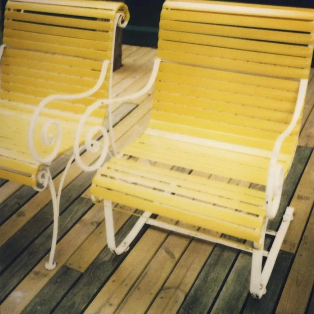 This Polaroid photograph was created using expired film stock, resulting in a dreamy image filled with vintage tones.