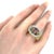 This lovely ring is crafted from 14k white gold with a polished finish and has an oval top set with assorted size and...