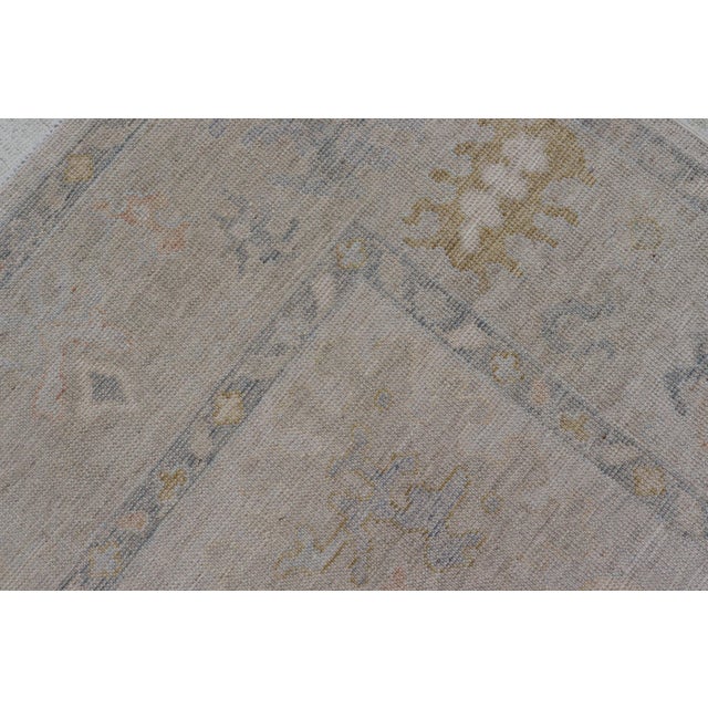 Modern Tribal Oushak With a Cream Border and Light Gray-Blue Background For Sale - Image 13 of 13