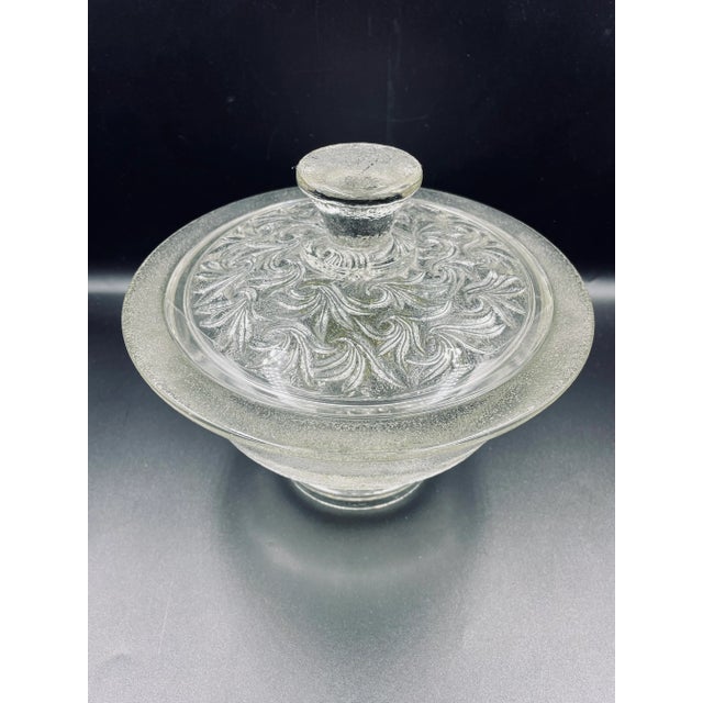 This wonderfully marvelous mod "Laurel" motif candy dish embodies many of the Scandinavian glass aesthetics of the era....