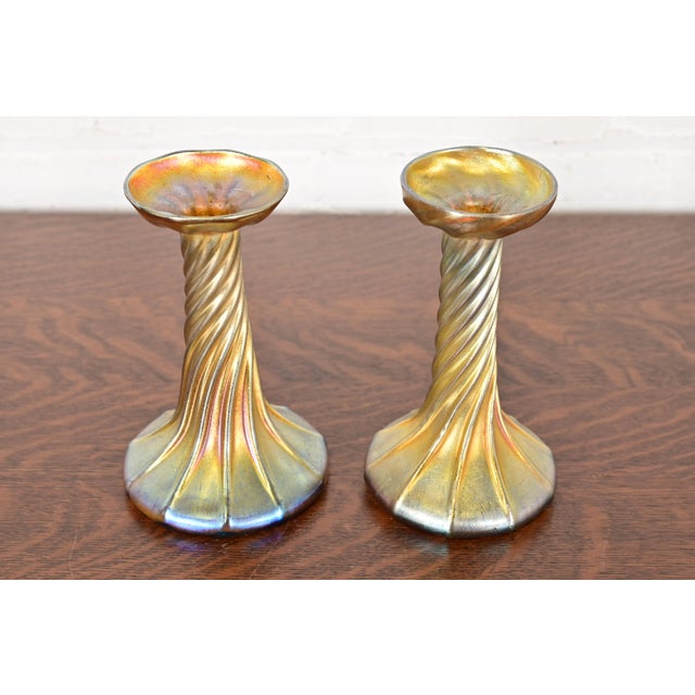 A gorgeous pair of Arts & Crafts or Art Nouveau period Favrile iridescent art glass candlesticks By Louis Comfort Tiffany...