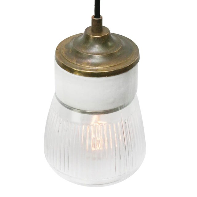 Vintage Industrial White Porcelain and Brass Pendant Light with Striped Clear Glass, in Very Good conditions. Designed...